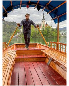 Pletna Boat Oarsman on Lake Bled